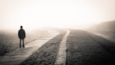 person-walking-on- road -